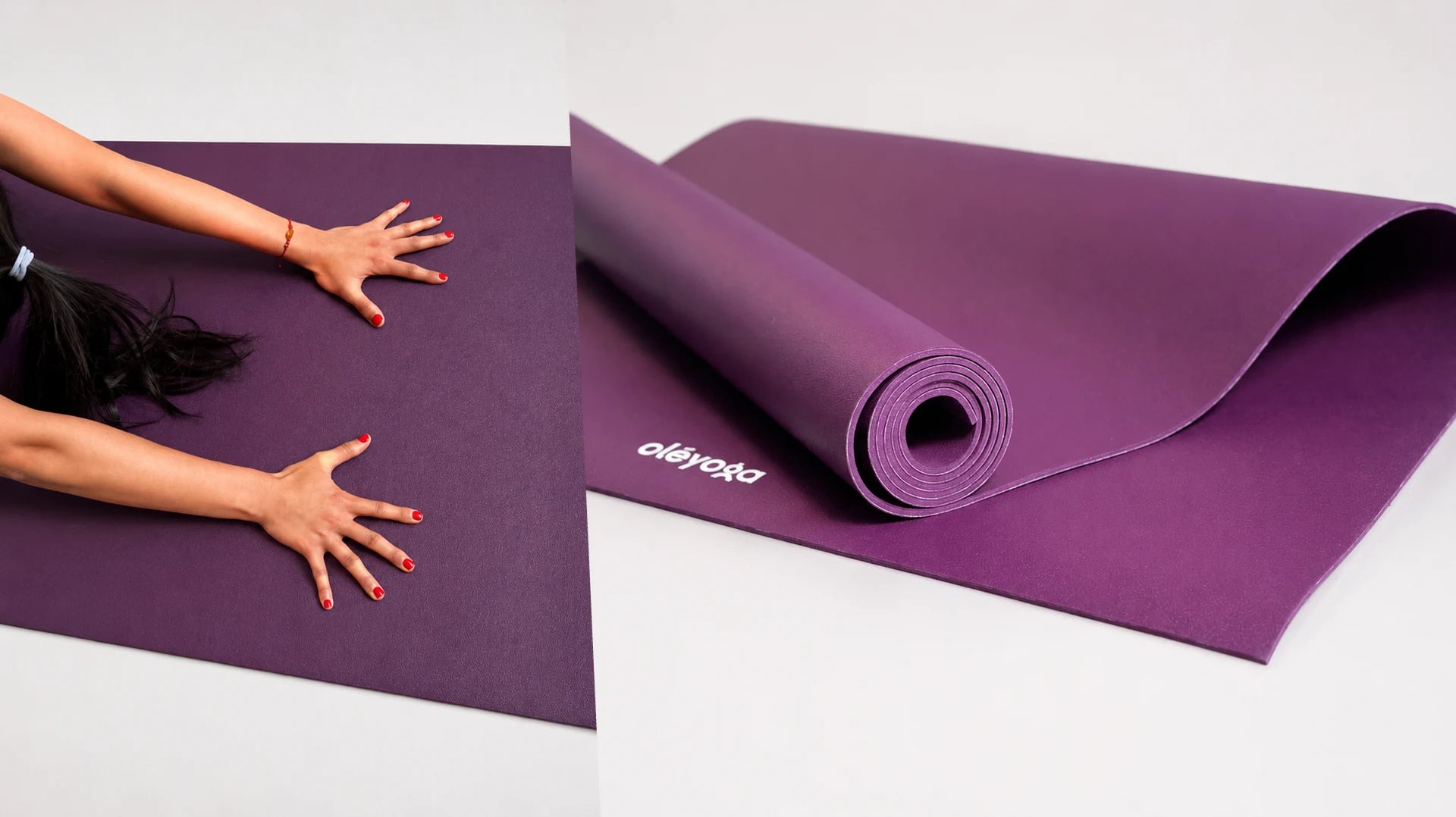 Arms and hands stretched on a purple natural rubber yoga mat, next to the mat half-rolled