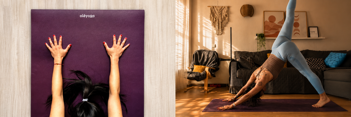 Mani su un tappetino oléyoga e pratica yoga in un soggiorno soleggiato
