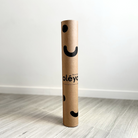 Plastic-free cardboard tube the oléyoga yoga mat ships in