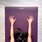 Hands pressing into the Deep Purple oléyoga mat during practice