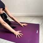 Downward dog on the Deep Purple oléyoga yoga mat